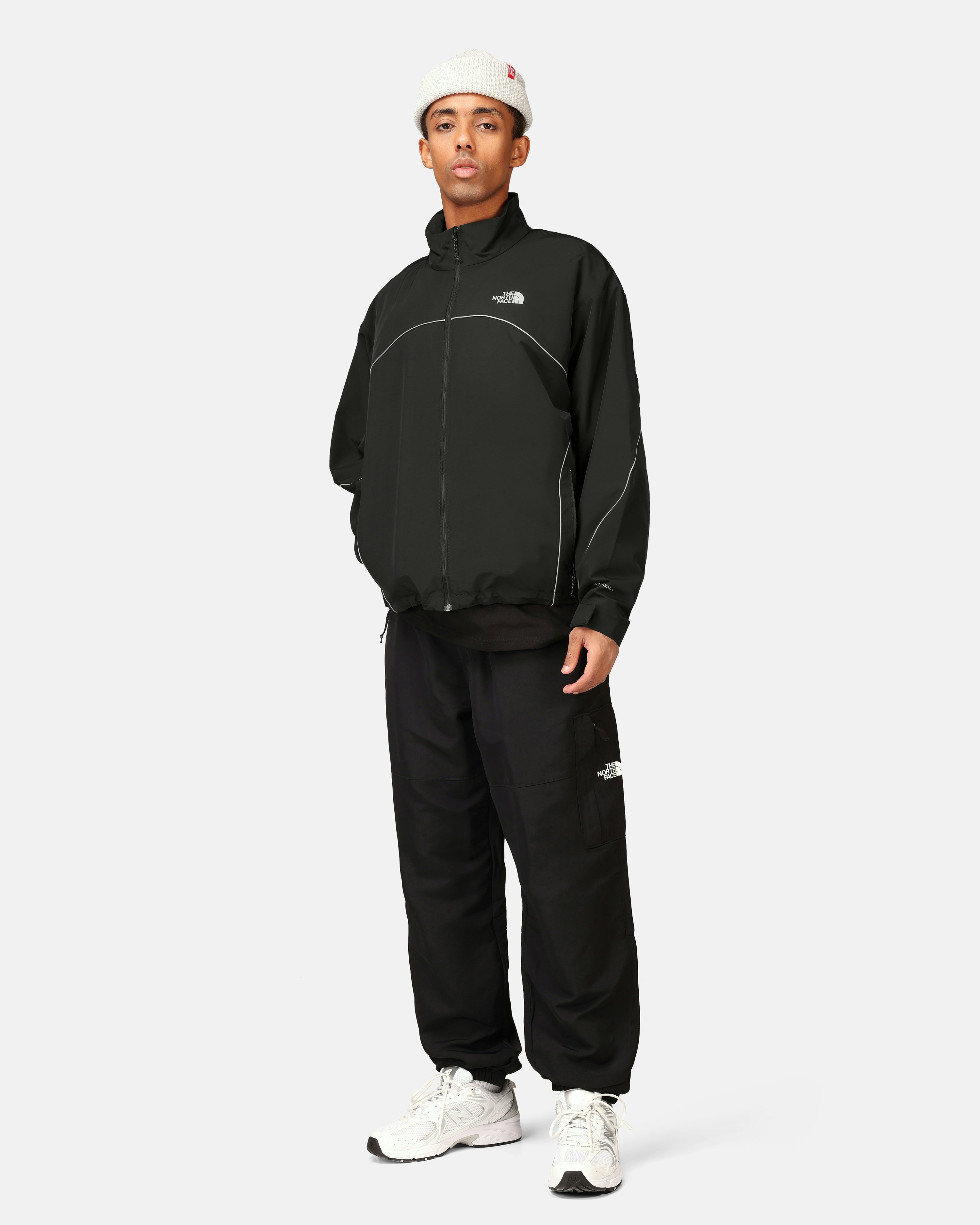 The North Face Tek Piping wind jacket in black